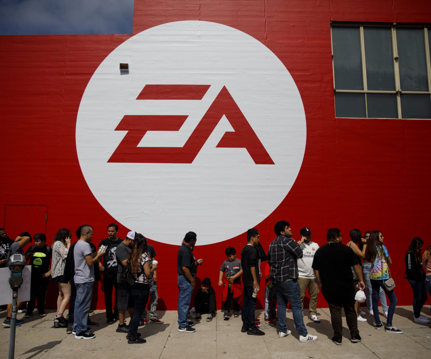 Electronic Arts Inc. (EA) signage is displayed as attendees wait in line for the EA Play event ahead of the E3 Electronic Entertainment Expo in Los Angeles, California, U.S., on Saturday, June 8, 2019. Photographer: Patrick T. Fallon/Bloomberg